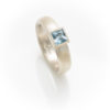 Silver ring with square topaz