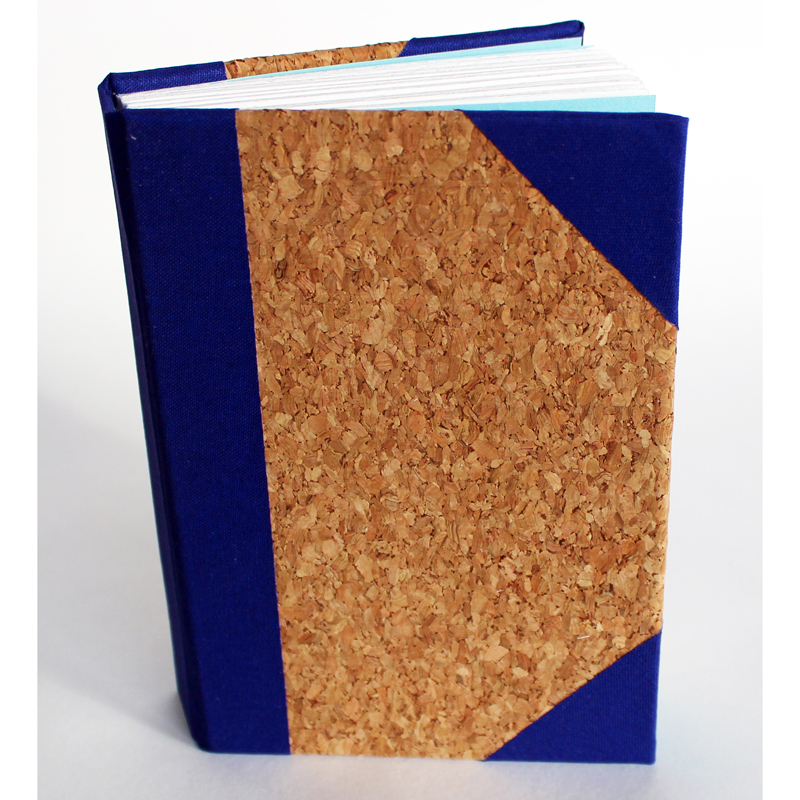 Cork sketchbook with blue corners and spine