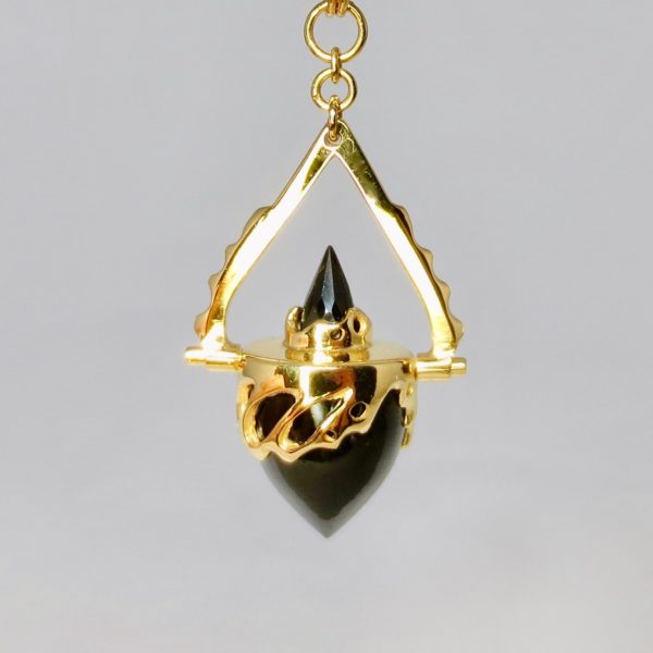 black onyx and gold pendant