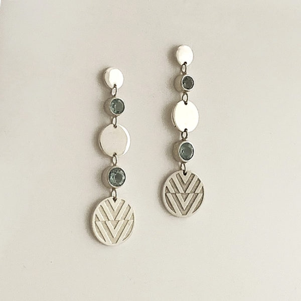 long drop earrings with green gemstones
