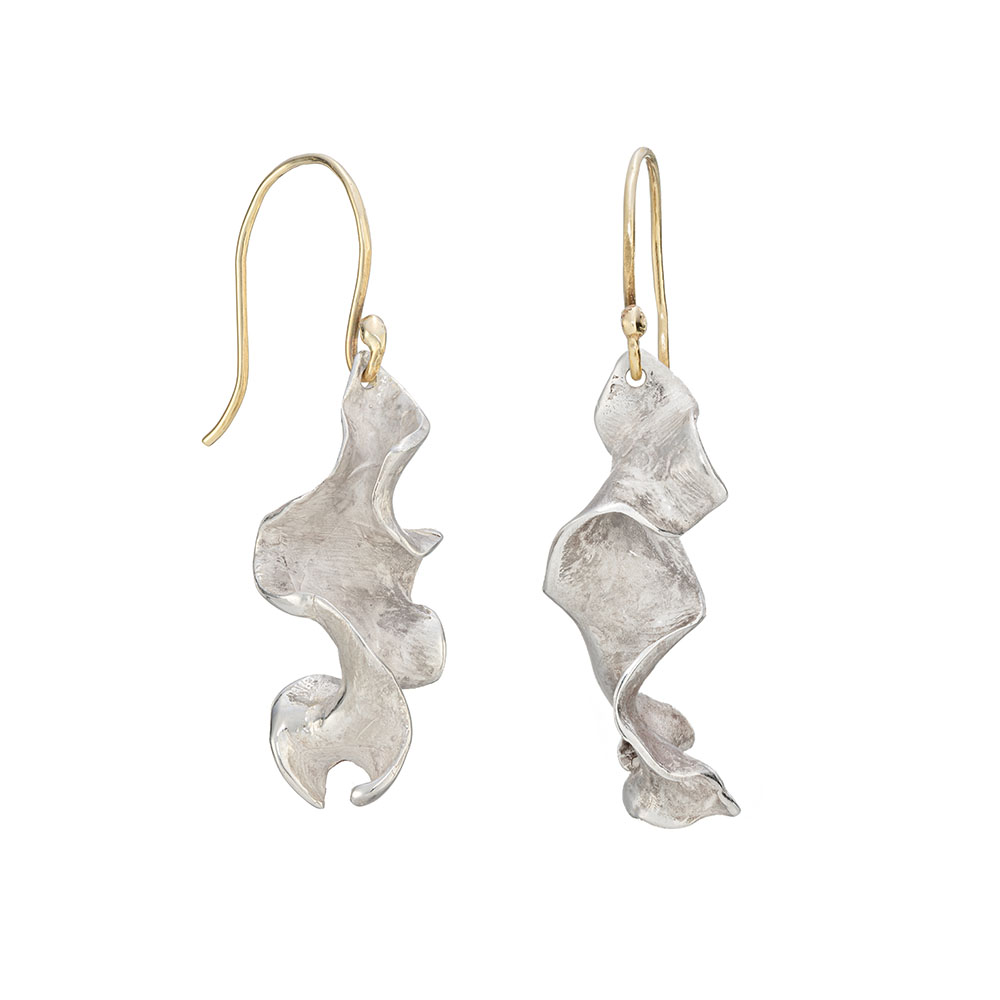 Silver drop earrings in the form of a curly ribbon of natural seaweed.