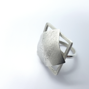 Statement silver ring on the surface