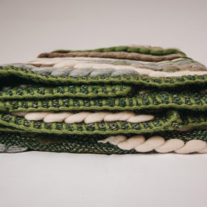 Blanket stitch detail of the Handwoven 'Caterpillar' throw featuring Merino wool by Cassandra Sabo