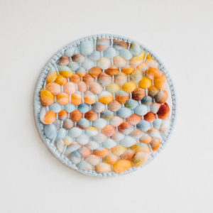 Cassandra Sabo’s ‘West Coast 2’ woven circular textile artwork from her West Coast Collection