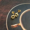 18k-Yellow Gold-Mini-Torus-Stud Earrings - on saucer for scale