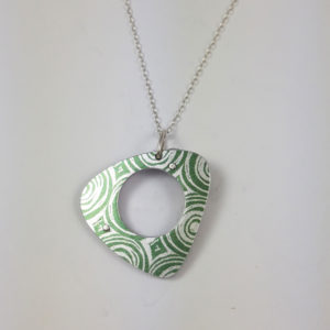 Green side of reversible suffragette pendant necklace