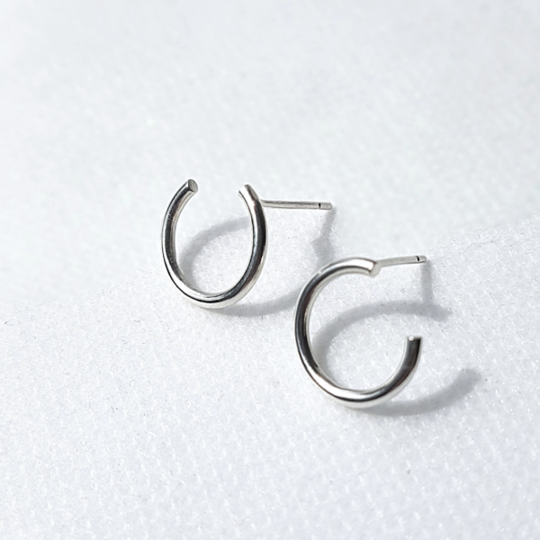 Circle Wire Stud Earrings on a white background