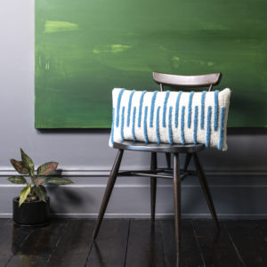 Hand tufted cushion in Cream and Pale blue-stripe.