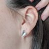 heart-shaped-silver-stud-earrings-modelled