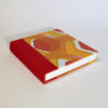 square book in red and yellow