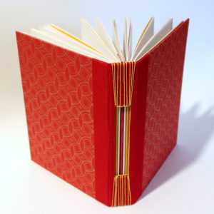 Red buttonhole book